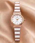DeFei Women Rose Gold Analog Watch with White Dial, Crystal Studded Metal Strap & Quartz Movement